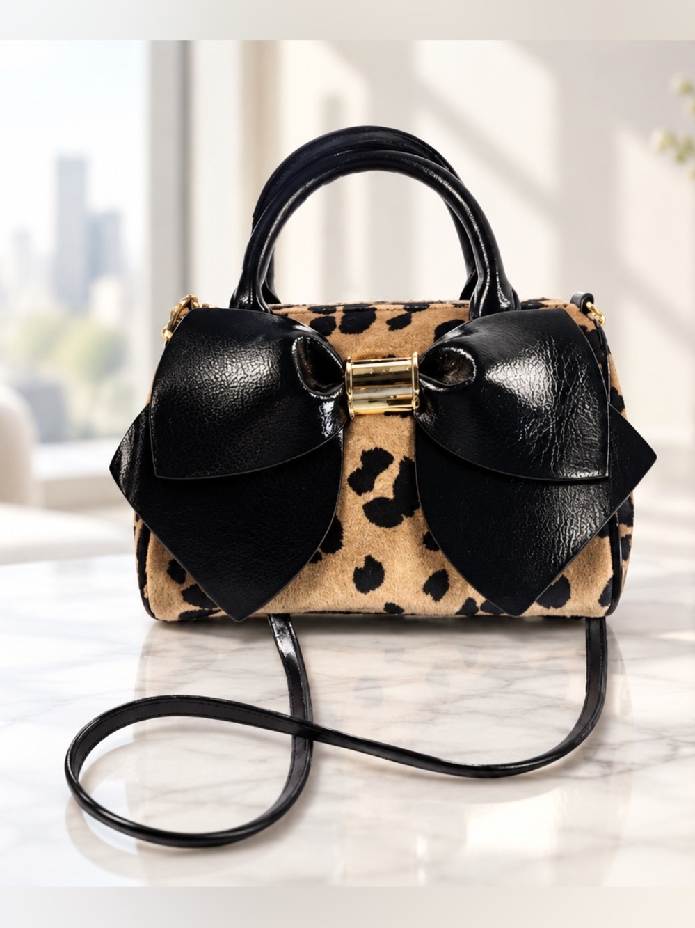 Betsey Johnson Leopard Print Crossbody Bag with Black patent Bow.